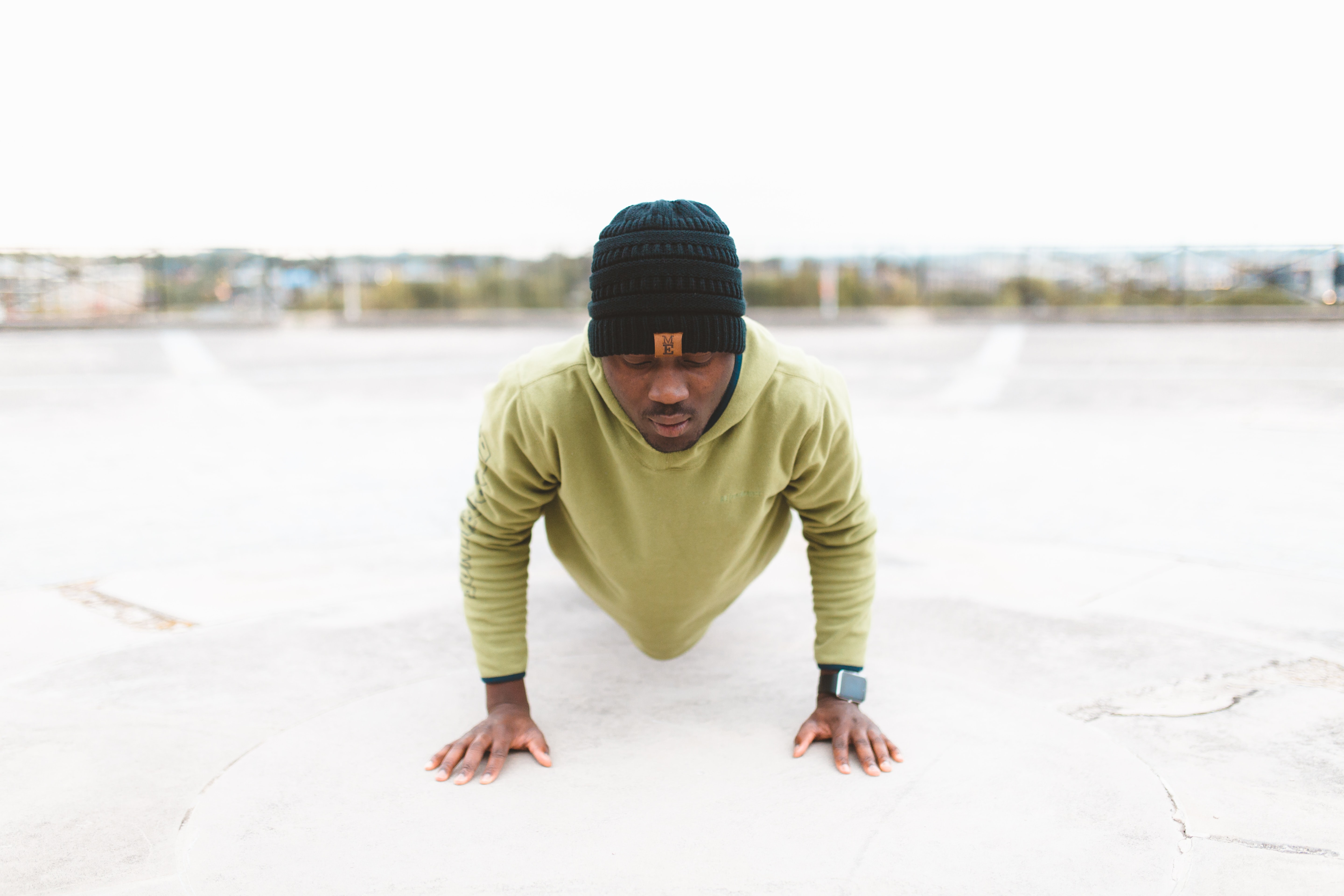 Man pushing himself in a workout